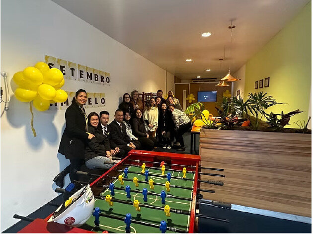 Equipe do Shopping SP Market reunida em ação de Setembro Amarelo
